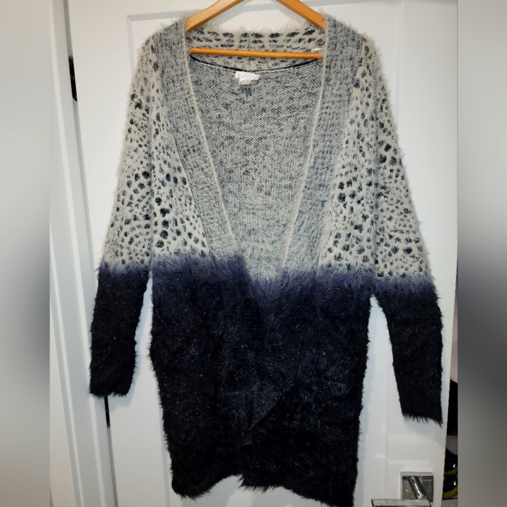 Long mid knee faded black to gray sweater with pockets.